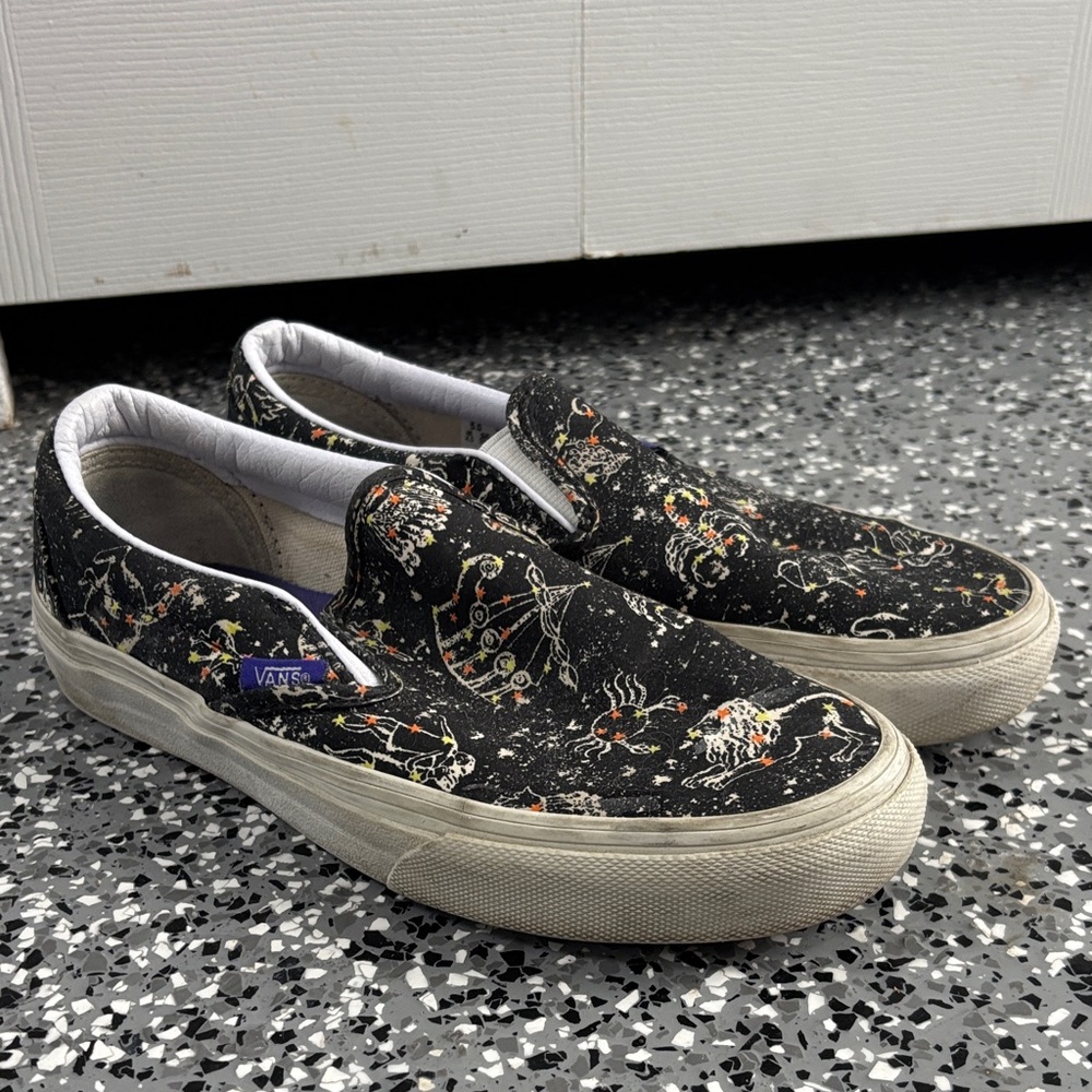 Vans Black and White Slip-On Sneakers